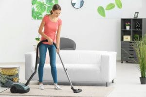 https://www.shutterstock.com/nl/image-photo/young-woman-hoovering-carpet-home-782569516